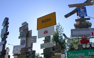 Koeln-Duesseldorf-Signpost-Forest-Schilderwald-Alaska-Highway-Watson-Lake-Yukon-Canada-Kanada-DSCN0371.jpg