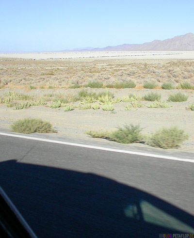 Good-bye-driving-away-from-Burning-Man-2007-Cars-in-line-leaving-Black-Rock-Desert-Nevada-USA-DSCN4740.jpg